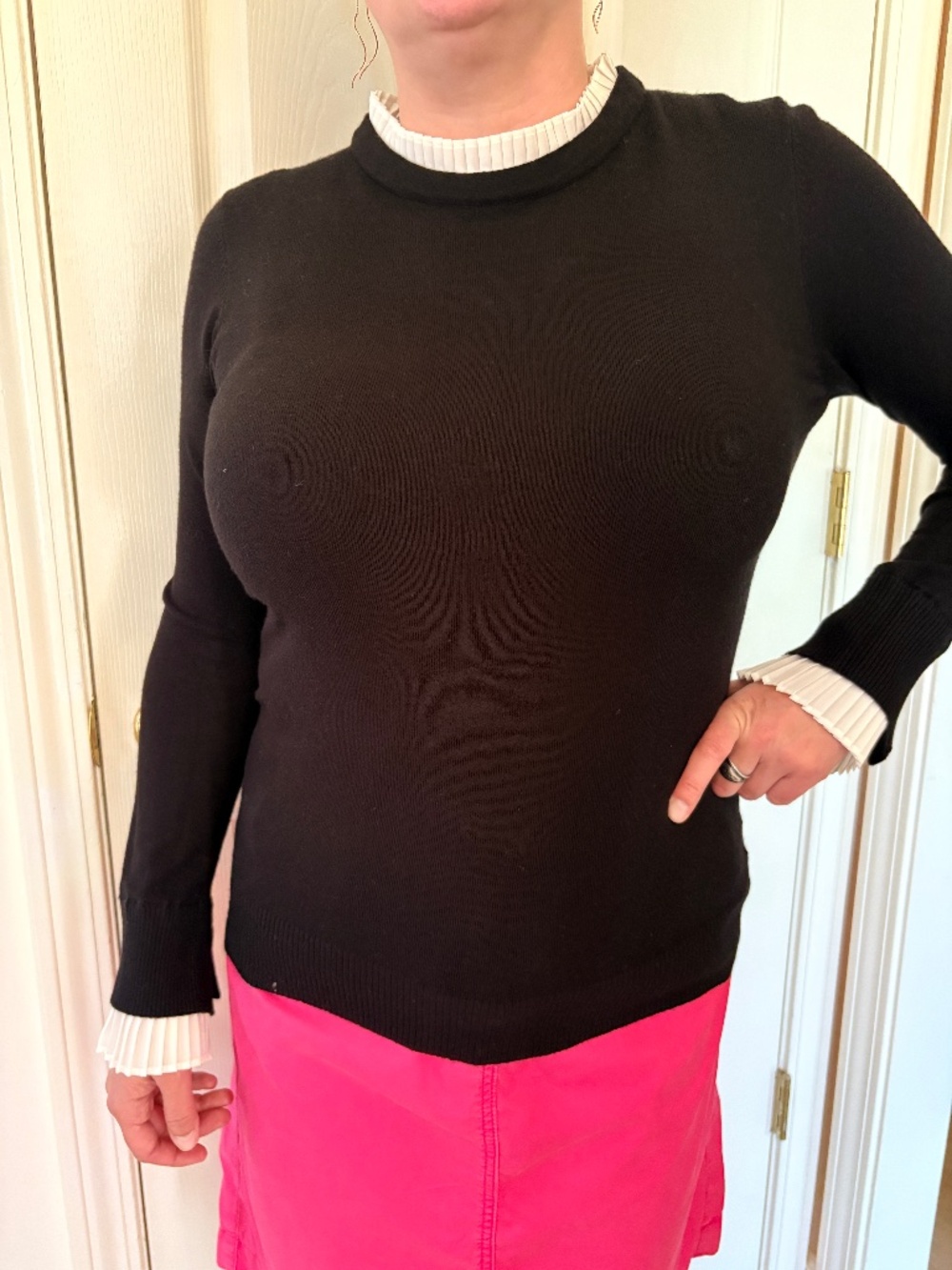 Vila Milanosweater with white ruffle on the neckline as well as at the cuffs and